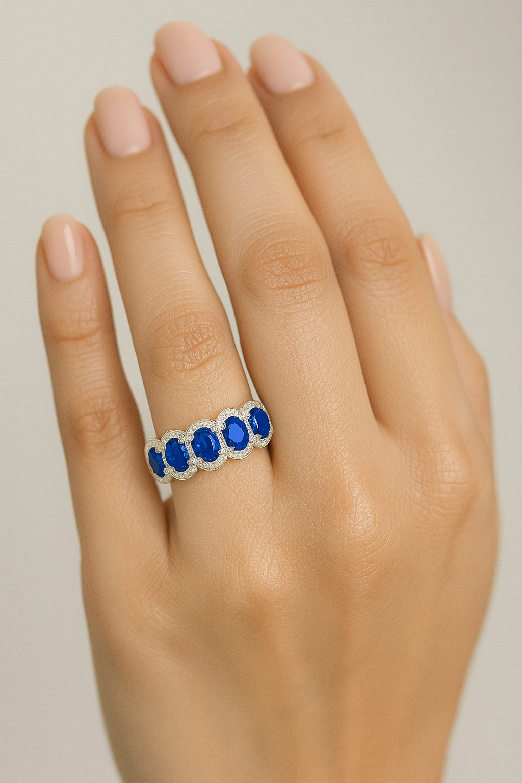 Five-Stone Sapphire Ring – Oval 5x4 mm with Diamond Halo