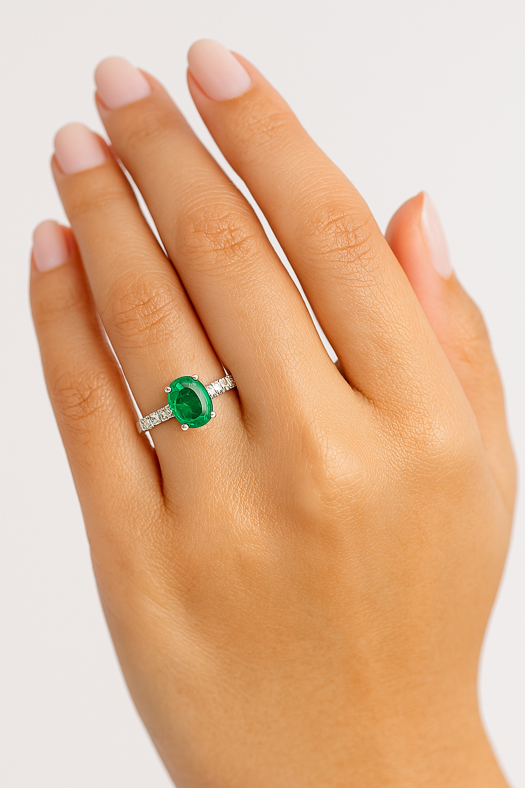 High-Mounted Oval Emerald Ring with Diamond-Set Band