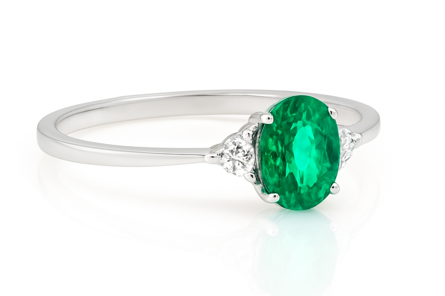 Oval Emerald Ring with Side Diamond Accents (7X5)