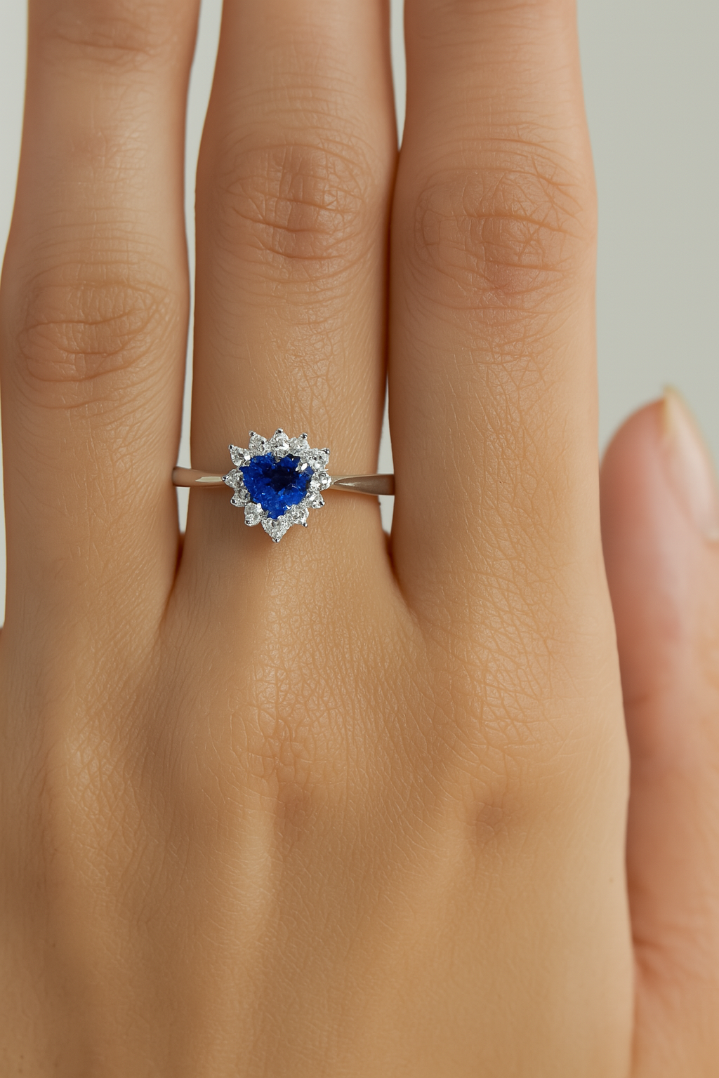 Heart-Shaped Blue Sapphire Ring with Diamond Halo