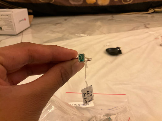 Octagon-Cut Emerald sorrounds with diamond Ring