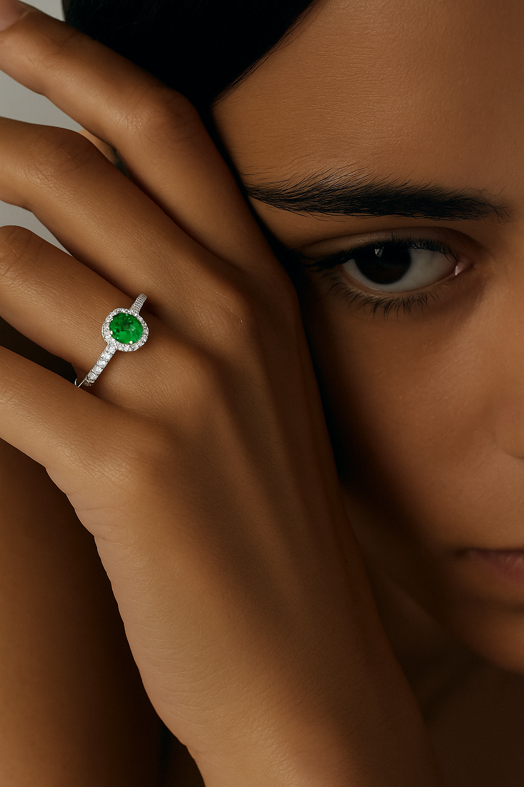 Oval Emerald Halo Ring with Diamond Accents
